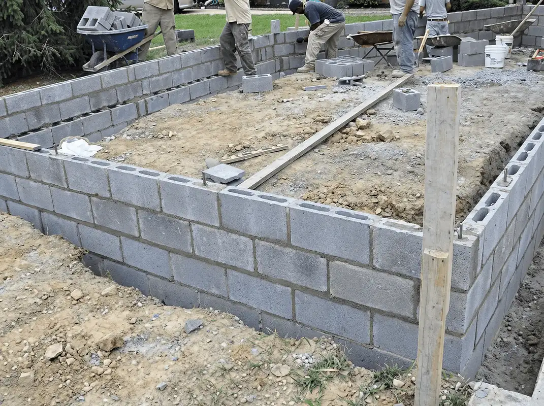 Professionals building a foundation with blocks in Naperville, IL