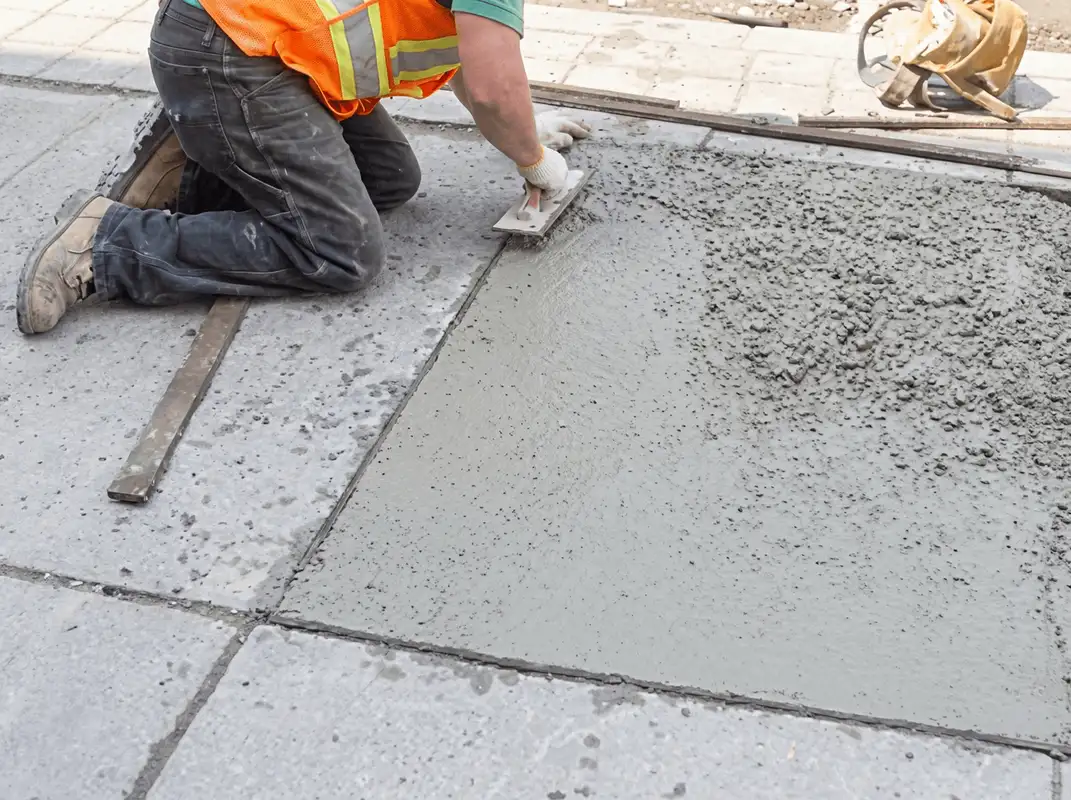Professional repairing a concrete floor in Naperville, IL