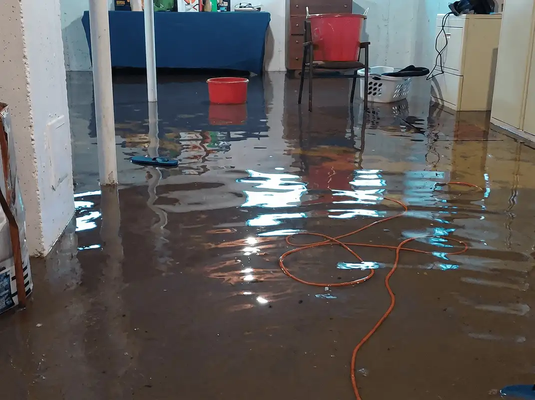 Basement with boiler, cabinets and washing machine completely flooded in Naperville, IL